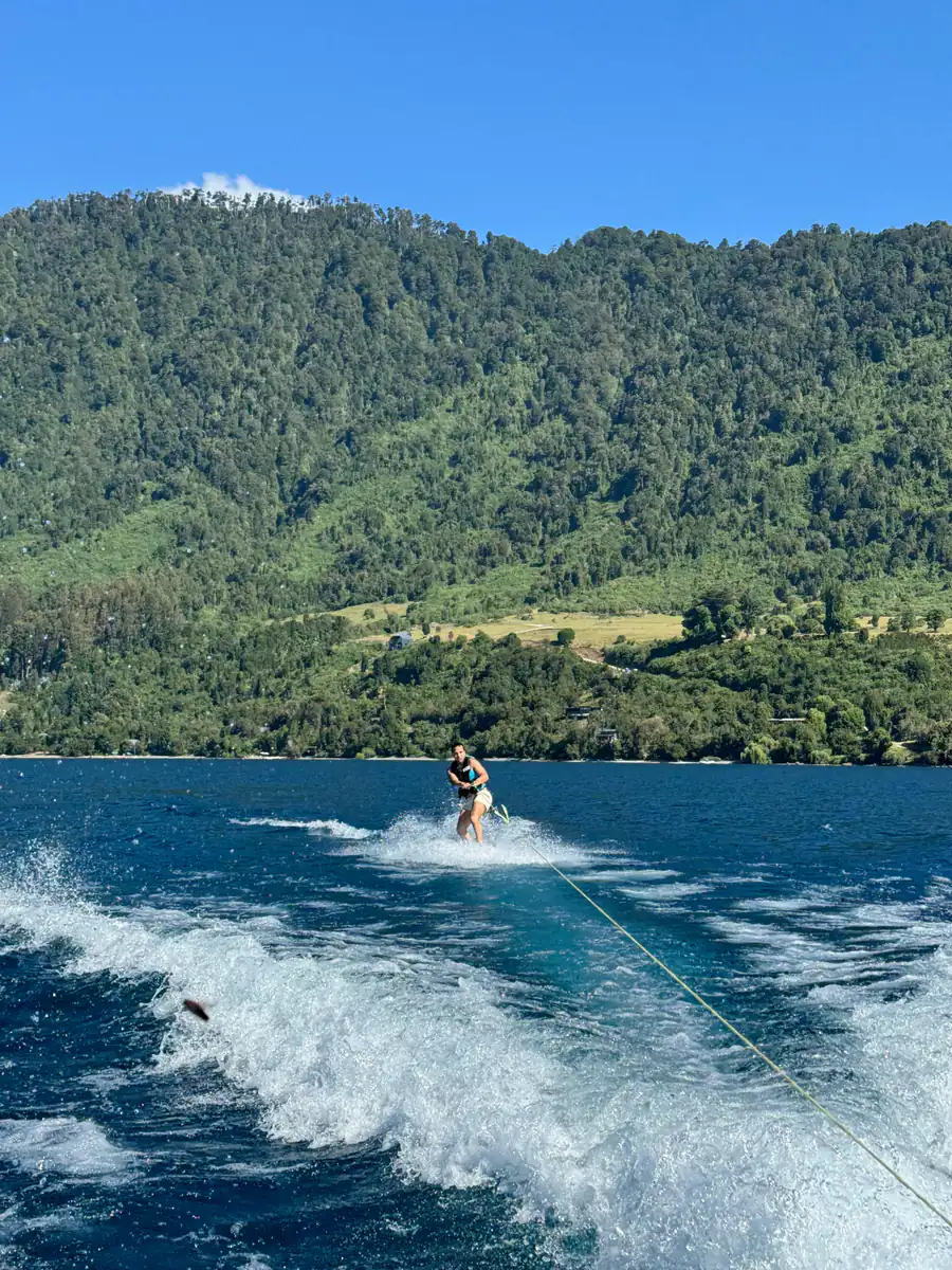 Wakeboarding on Yelcho Lake with Andes backdrop